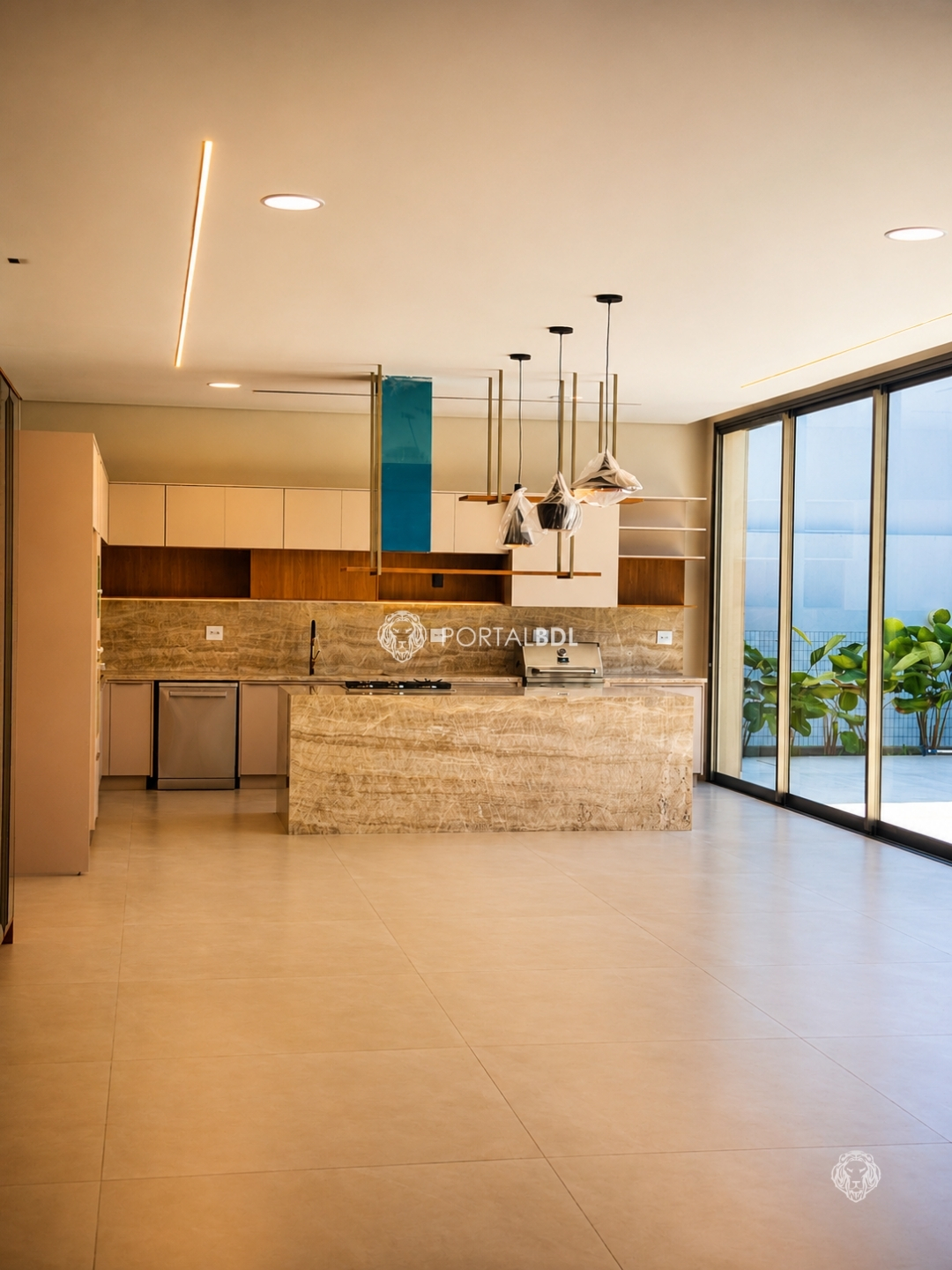 Sala ampla integrada à cozinha gourmet com ilha em quartzito